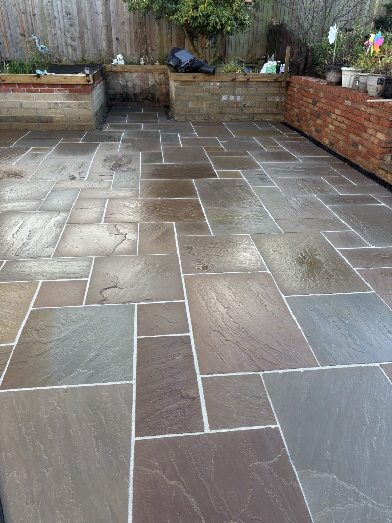 Indian Sandstone Paving Completed in the Rain to Open On Time
