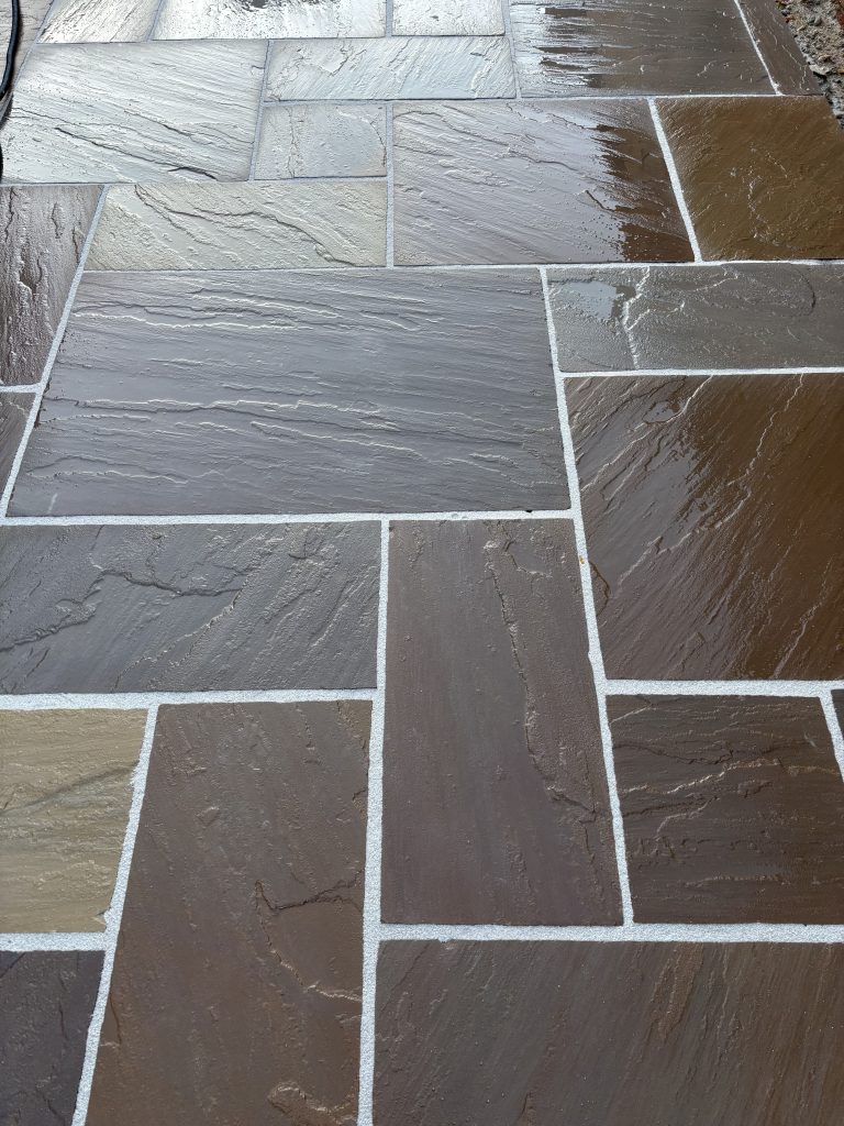 Indian Sandstone paving installed and grouted in the rain with GftK vdw 850 plus
